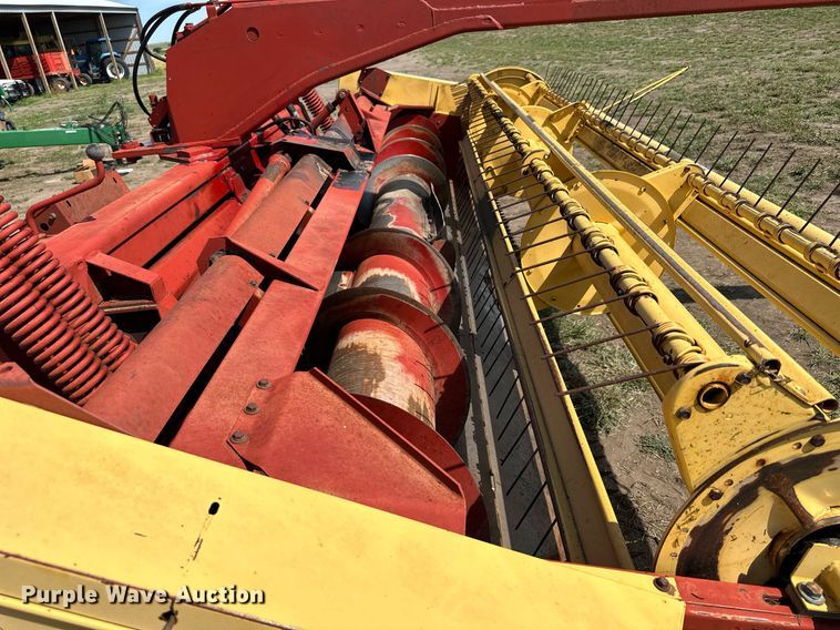 image for item NP9975 New Holland 116  swather / windrower
