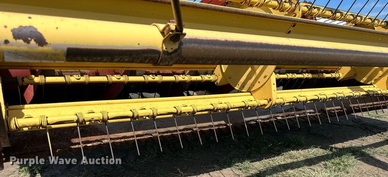 image for item NP9975 New Holland 116  swather / windrower