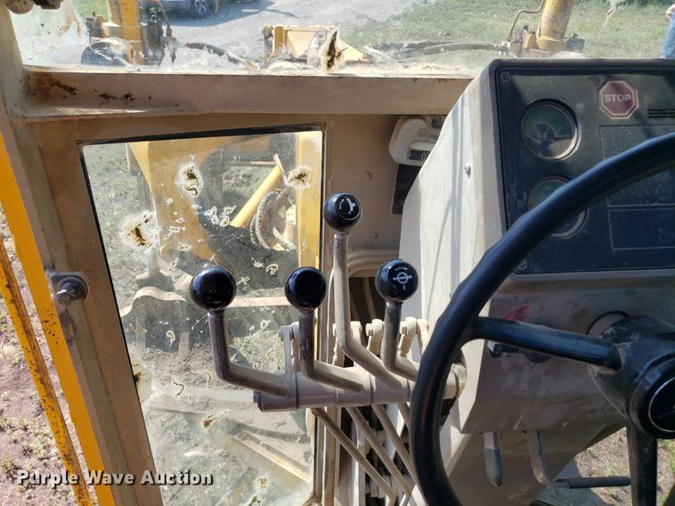 image for item DO3024 1991 John Deere 770B-H  motor grader