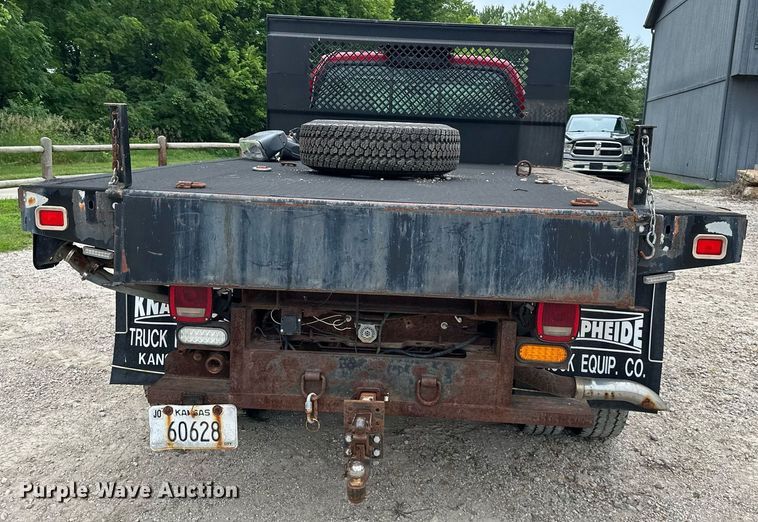 image for item JX9026 2004 Ford  F350 Super Duty  flatbed pickup truck