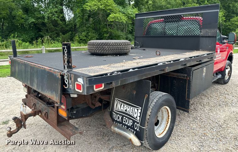 image for item JX9026 2004 Ford  F350 Super Duty  flatbed pickup truck