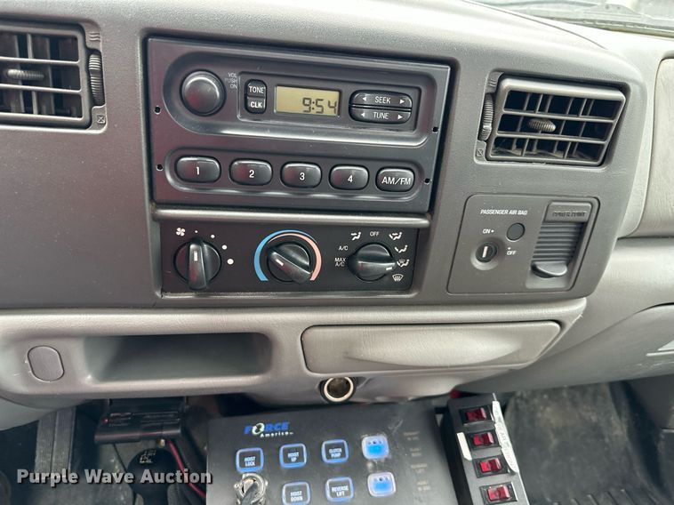 image for item JX9026 2004 Ford  F350 Super Duty  flatbed pickup truck