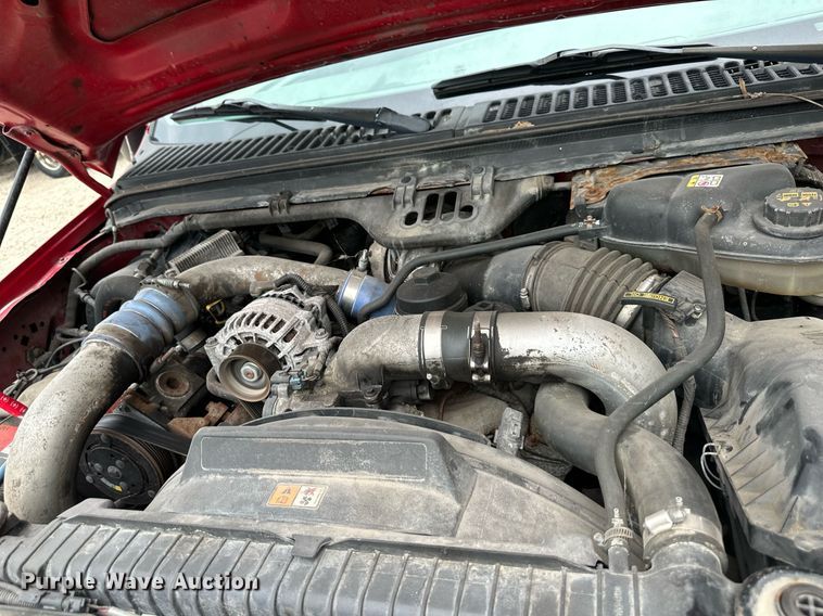 image for item JX9026 2004 Ford  F350 Super Duty  flatbed pickup truck