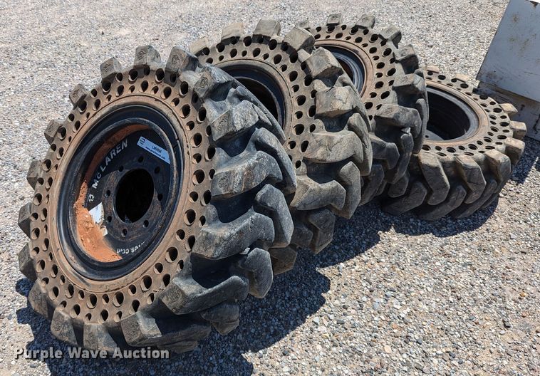 image for item LM9996 (4) McLaren 33x12-16 solid tires and wheels