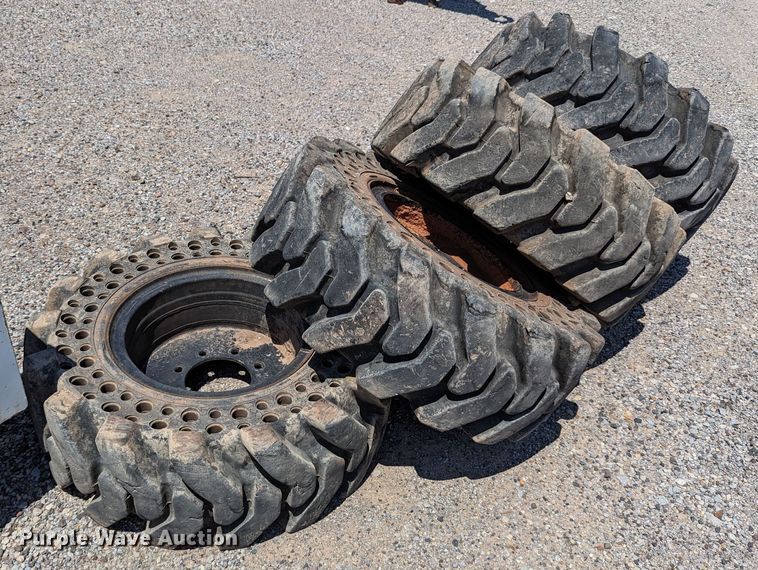 image for item LM9996 (4) McLaren 33x12-16 solid tires and wheels