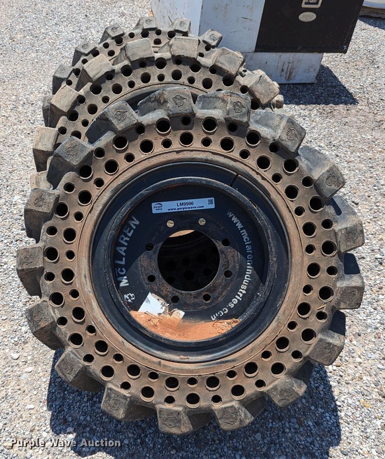 image for item LM9996 (4) McLaren 33x12-16 solid tires and wheels