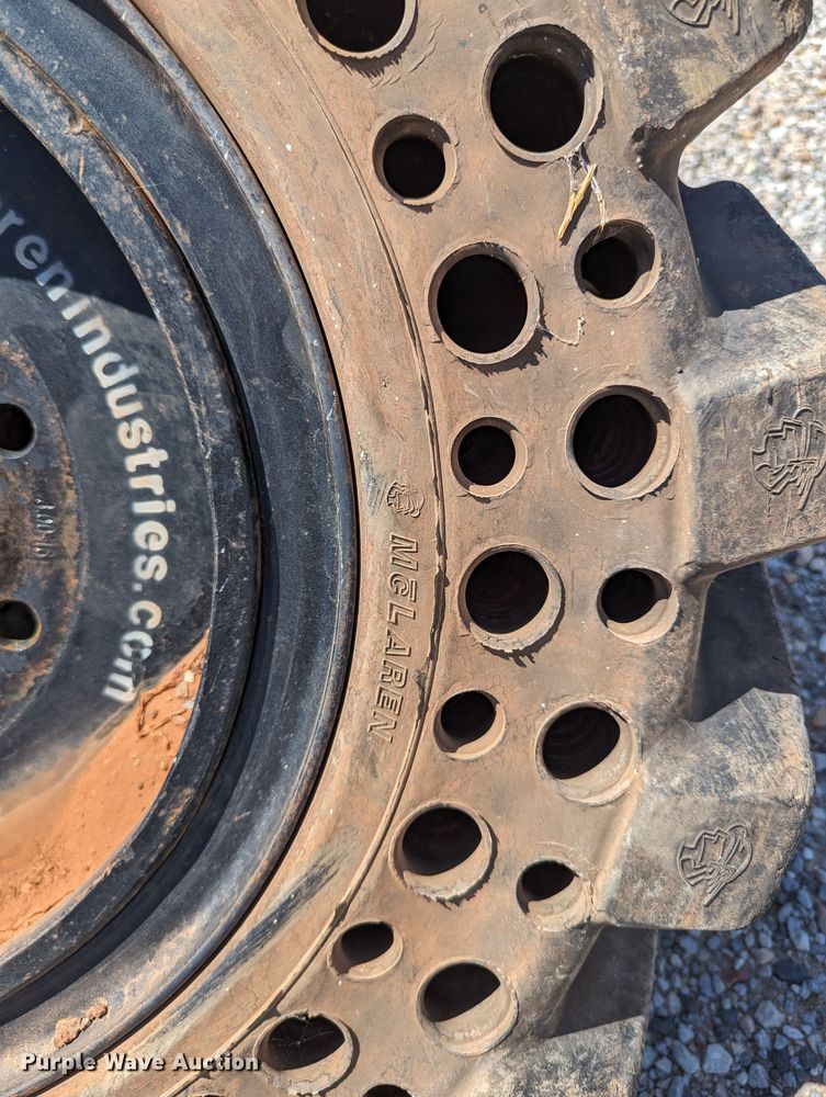 image for item LM9996 (4) McLaren 33x12-16 solid tires and wheels