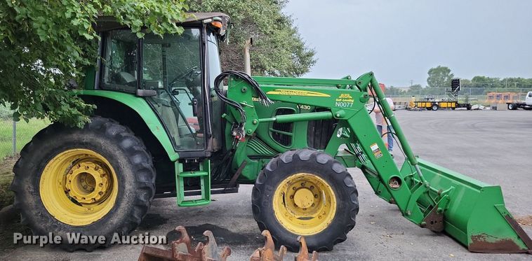 image for item LS9641 2010 John Deere 6430  MFWD tractor