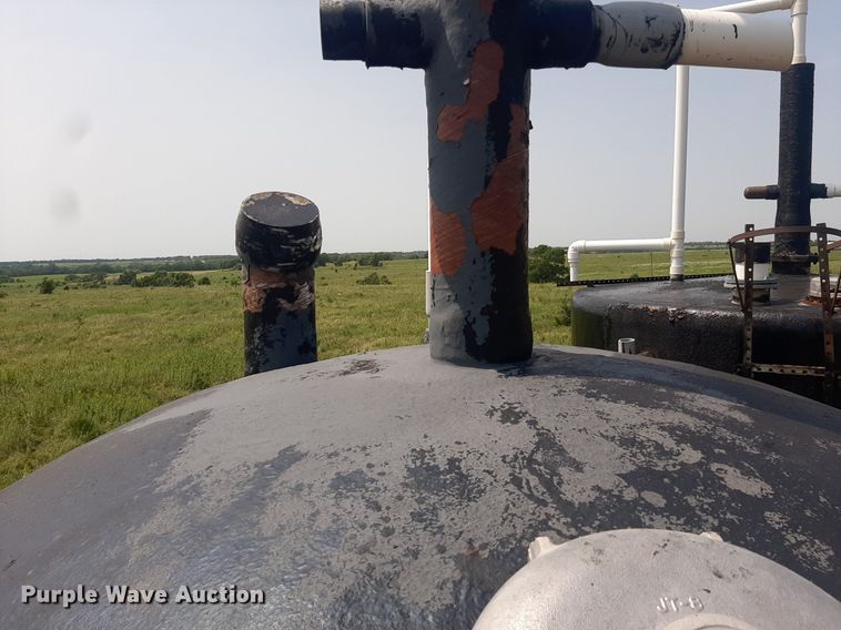 Fiberglass gun barrel tank in Winfield, KS Item DO3070 sold Purple Wave