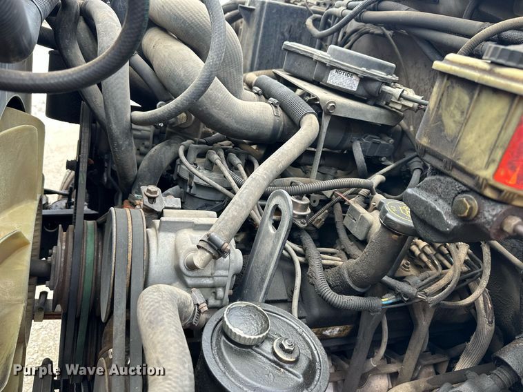 image for item DS2223 1997 Ford F700  chipper truck