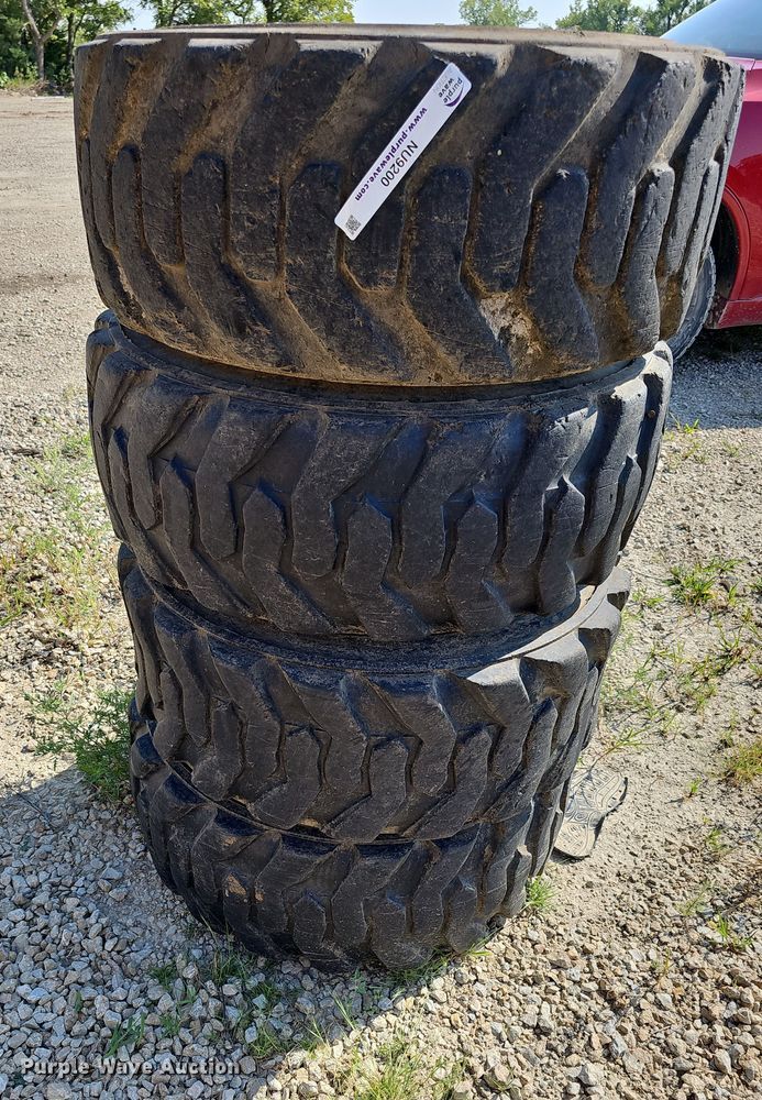 image for item NU9200 (4) Galaxy skid steer tires and wheels