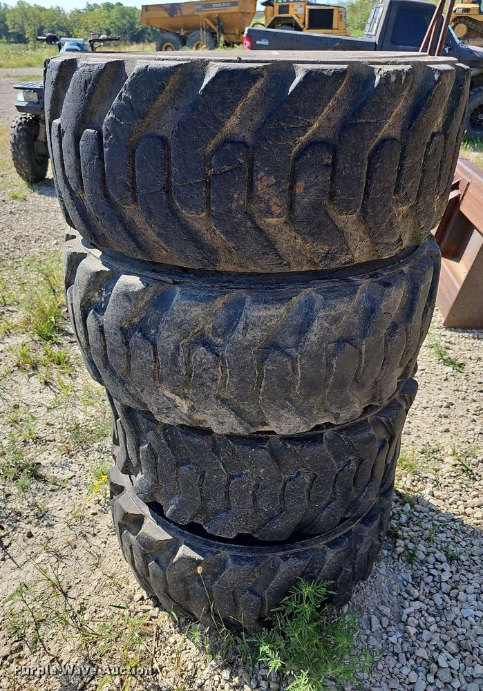 image for item NU9200 (4) Galaxy skid steer tires and wheels