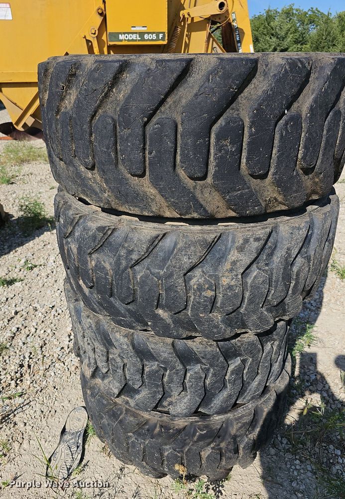 image for item NU9200 (4) Galaxy skid steer tires and wheels