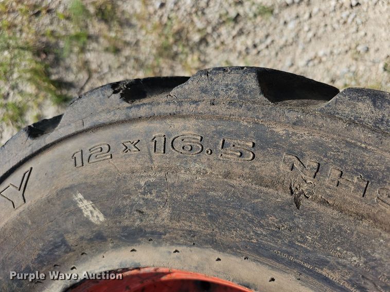 image for item NU9200 (4) Galaxy skid steer tires and wheels