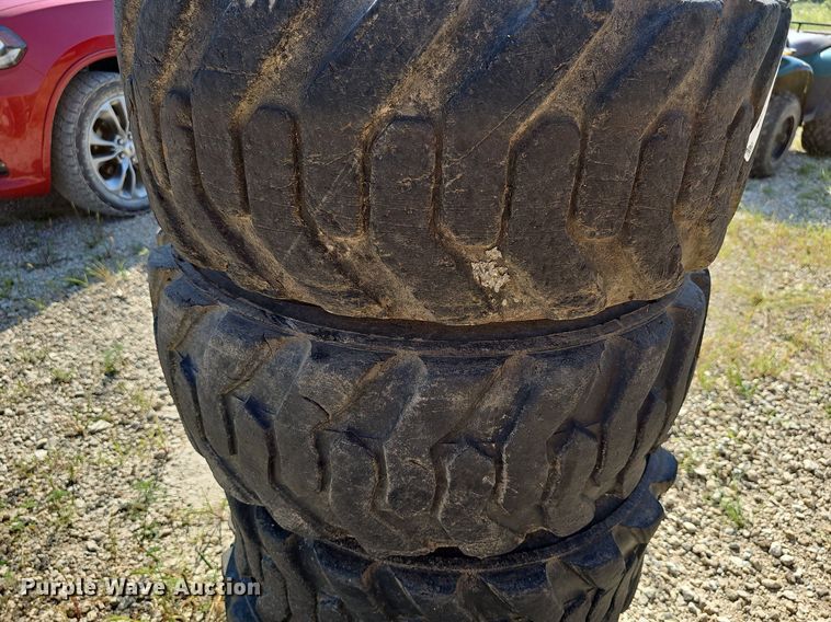 image for item NU9200 (4) Galaxy skid steer tires and wheels