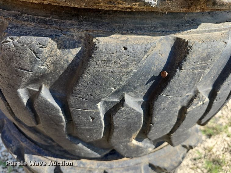 image for item NU9200 (4) Galaxy skid steer tires and wheels
