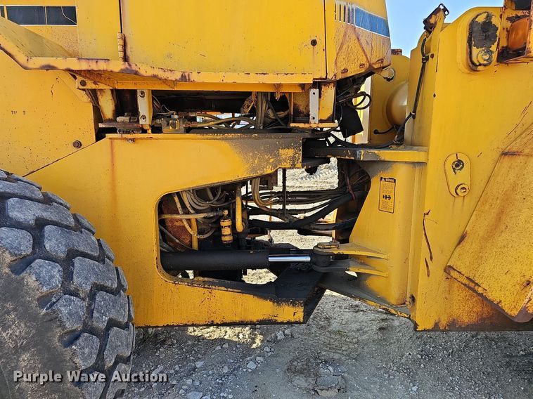 image for item DQ0168 1990 John Deere 644E  wheel loader