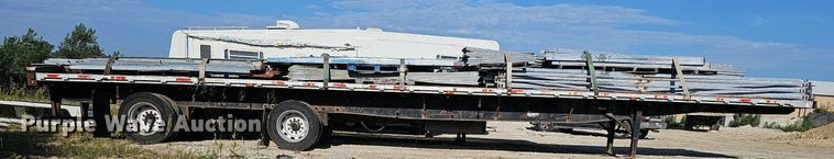 image for item DQ0179 1999 Wabash Flat FLCVHCM  flatbed trailer