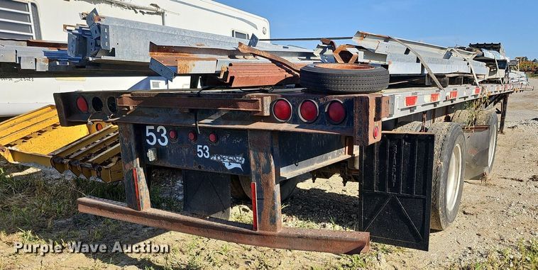 image for item DQ0179 1999 Wabash Flat FLCVHCM  flatbed trailer