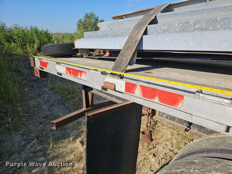 image for item DQ0179 1999 Wabash Flat FLCVHCM  flatbed trailer