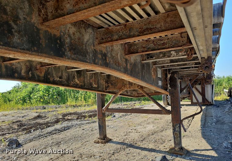 image for item DQ0179 1999 Wabash Flat FLCVHCM  flatbed trailer