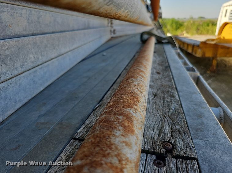 image for item DQ0179 1999 Wabash Flat FLCVHCM  flatbed trailer