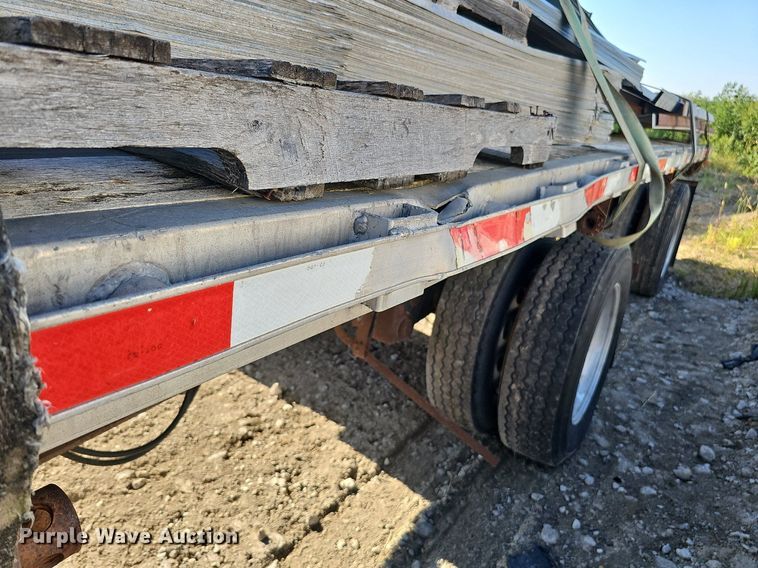 image for item DQ0179 1999 Wabash Flat FLCVHCM  flatbed trailer