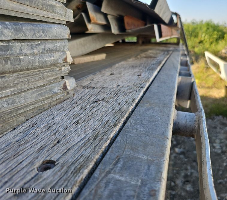 image for item DQ0179 1999 Wabash Flat FLCVHCM  flatbed trailer