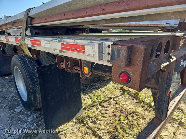 image for item DQ0179 1999 Wabash Flat FLCVHCM  flatbed trailer