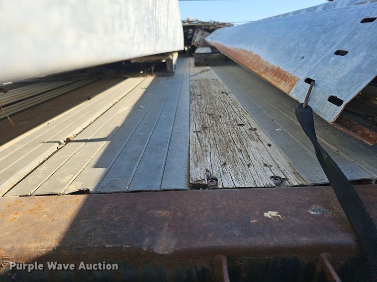 image for item DQ0179 1999 Wabash Flat FLCVHCM  flatbed trailer