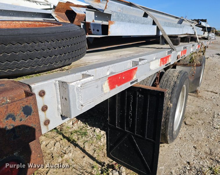 image for item DQ0179 1999 Wabash Flat FLCVHCM  flatbed trailer