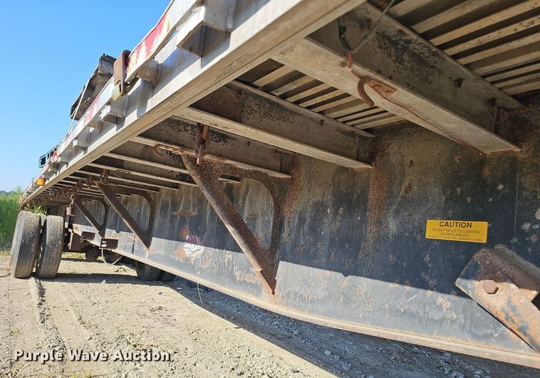 image for item DQ0179 1999 Wabash Flat FLCVHCM  flatbed trailer
