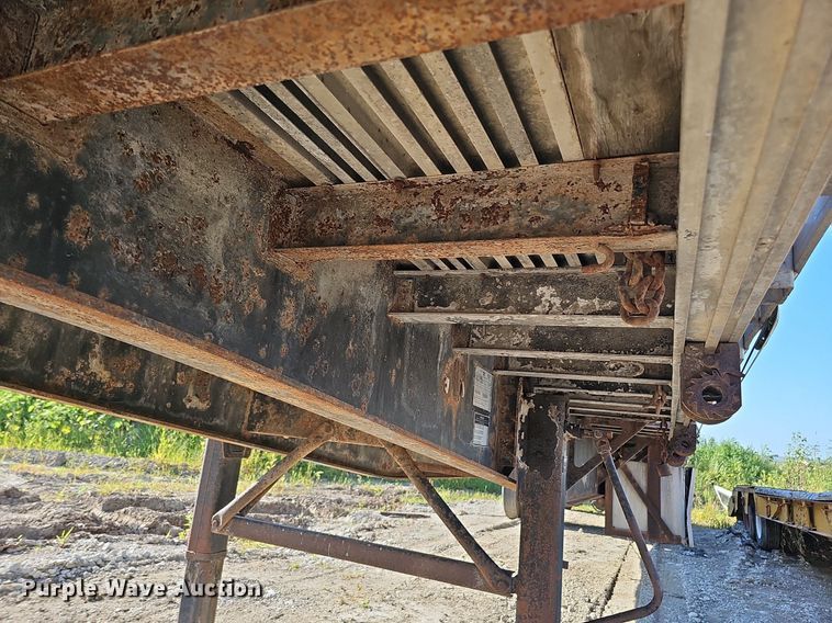 image for item DQ0179 1999 Wabash Flat FLCVHCM  flatbed trailer