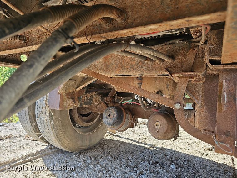 image for item DQ0179 1999 Wabash Flat FLCVHCM  flatbed trailer