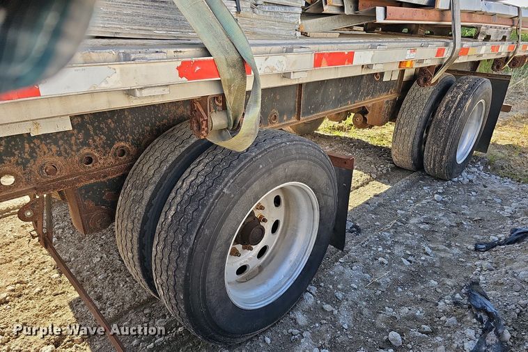 image for item DQ0179 1999 Wabash Flat FLCVHCM  flatbed trailer