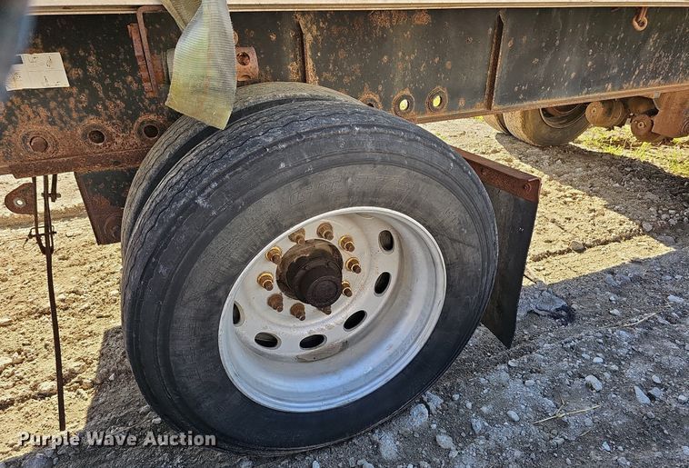 image for item DQ0179 1999 Wabash Flat FLCVHCM  flatbed trailer