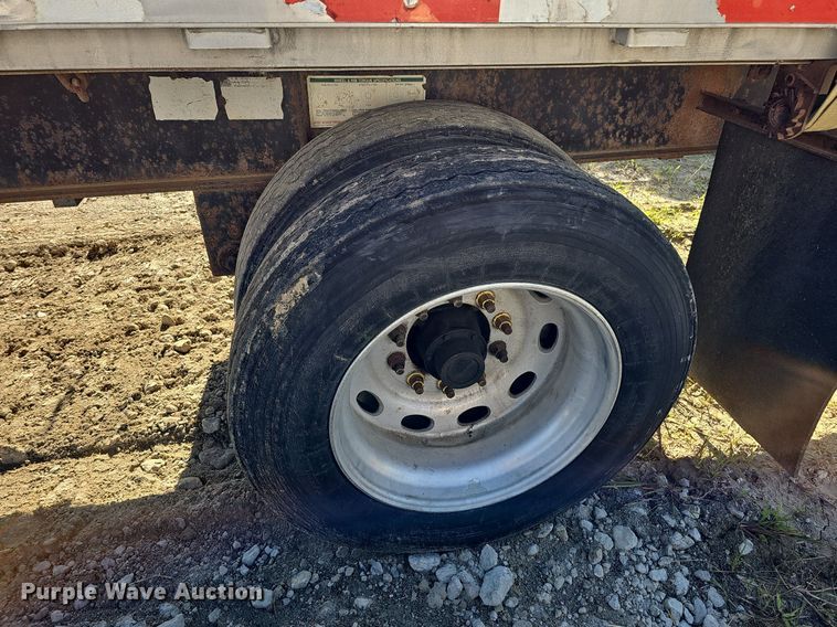 image for item DQ0179 1999 Wabash Flat FLCVHCM  flatbed trailer