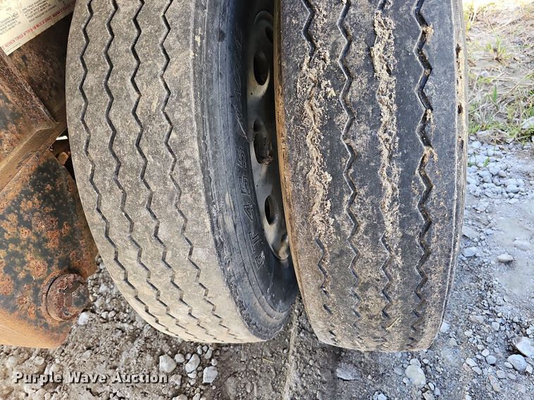 image for item DQ0179 1999 Wabash Flat FLCVHCM  flatbed trailer