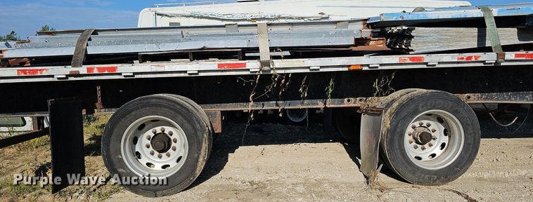 image for item DQ0179 1999 Wabash Flat FLCVHCM  flatbed trailer