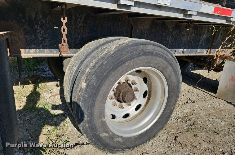 image for item DQ0179 1999 Wabash Flat FLCVHCM  flatbed trailer