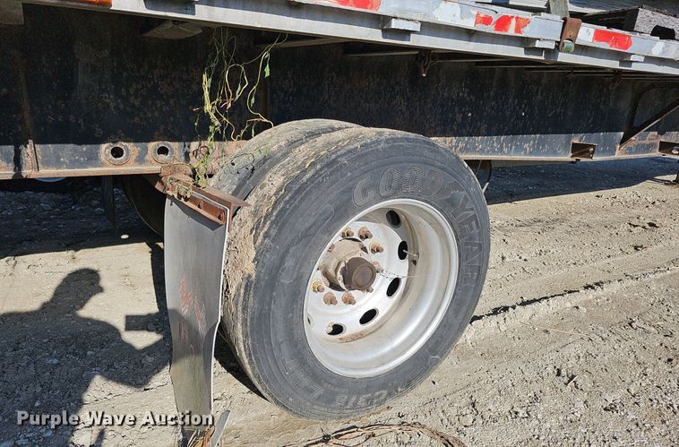 image for item DQ0179 1999 Wabash Flat FLCVHCM  flatbed trailer