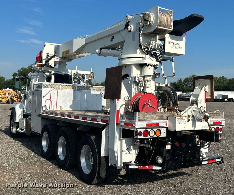 image for item KW9105 2009 International Paystar 5900 SFA  tri-drive digger derrick truck