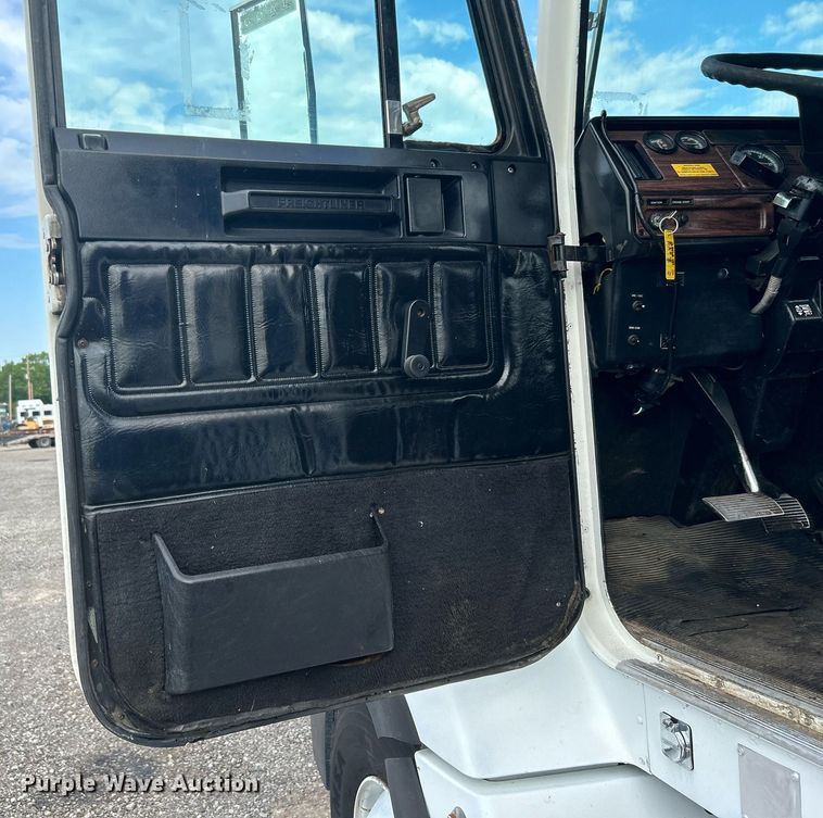 image for item KW9114 1998 Freightliner FLD112 vacuum truck