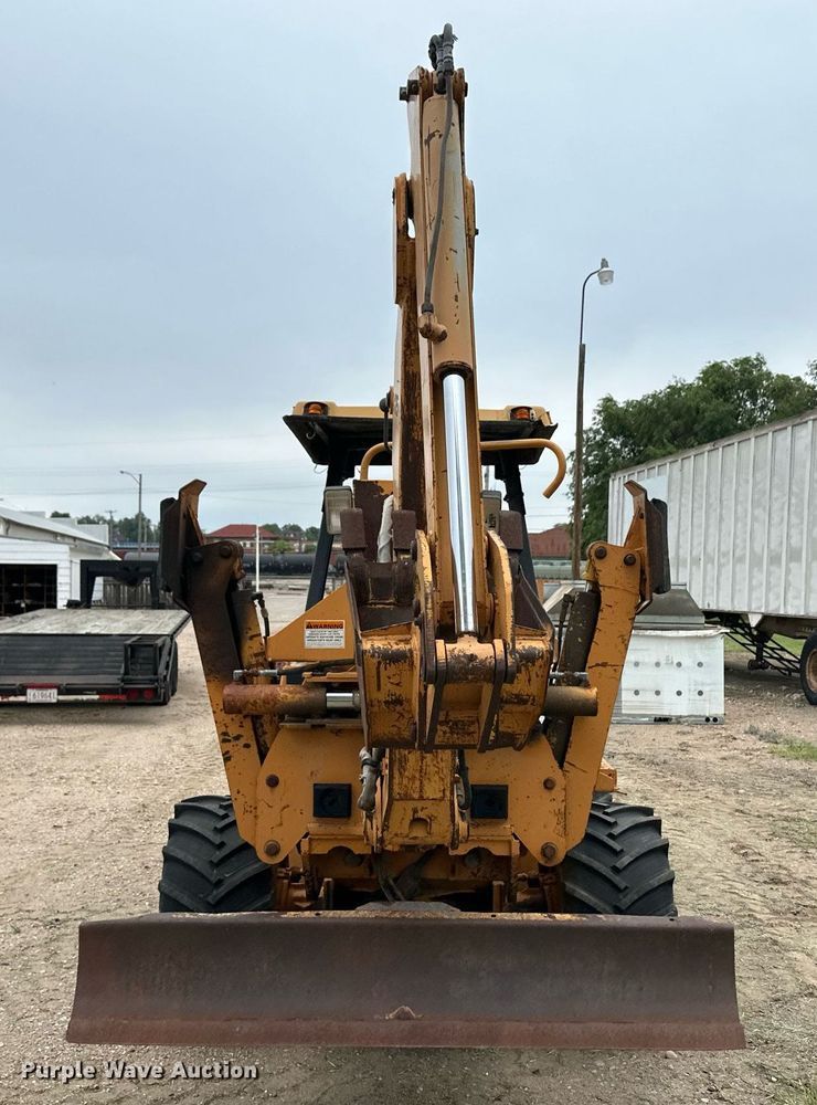 image for item NY9219 2000 Case 560  trencher with trailer