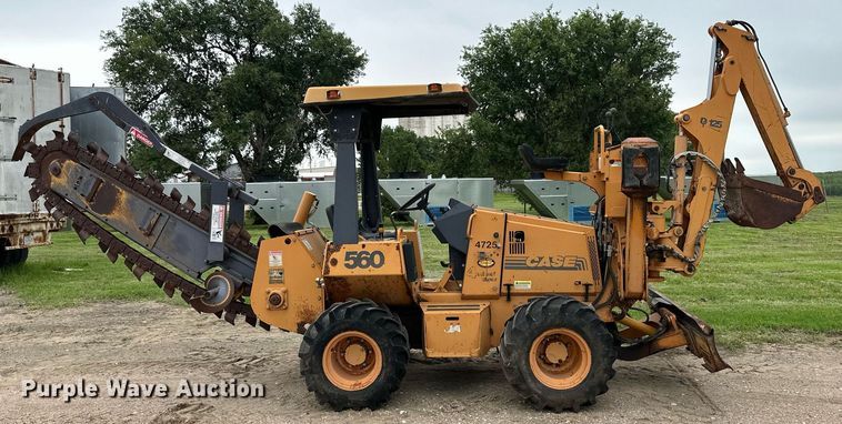 image for item NY9219 2000 Case 560  trencher with trailer