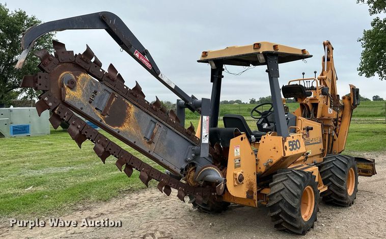 image for item NY9219 2000 Case 560  trencher with trailer