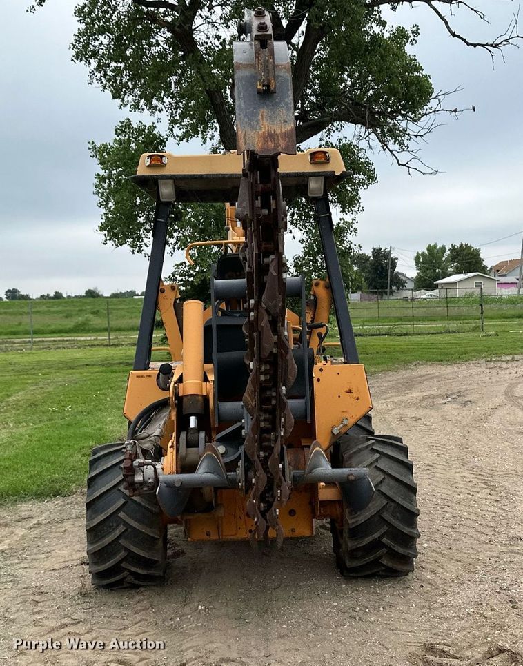 image for item NY9219 2000 Case 560  trencher with trailer