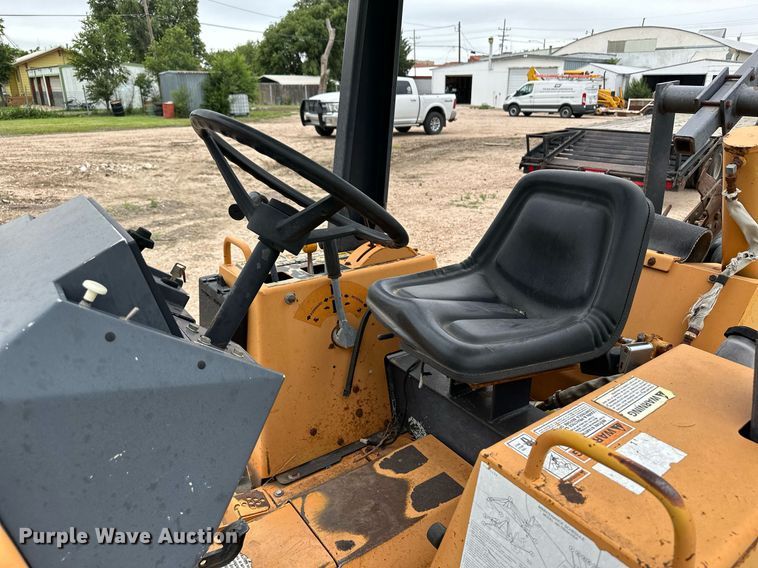 image for item NY9219 2000 Case 560  trencher with trailer