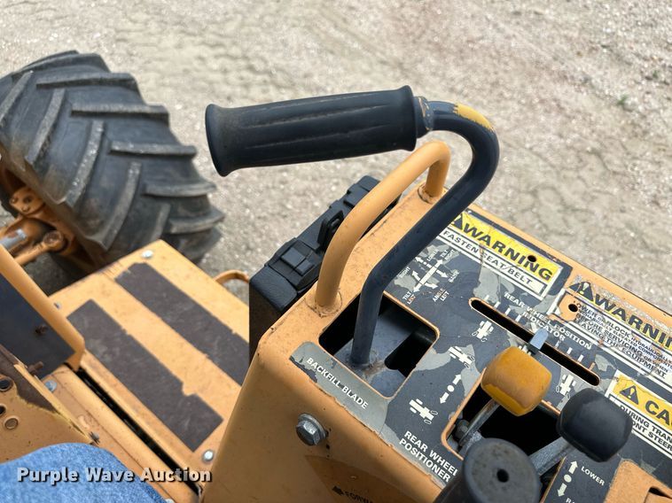 image for item NY9219 2000 Case 560  trencher with trailer