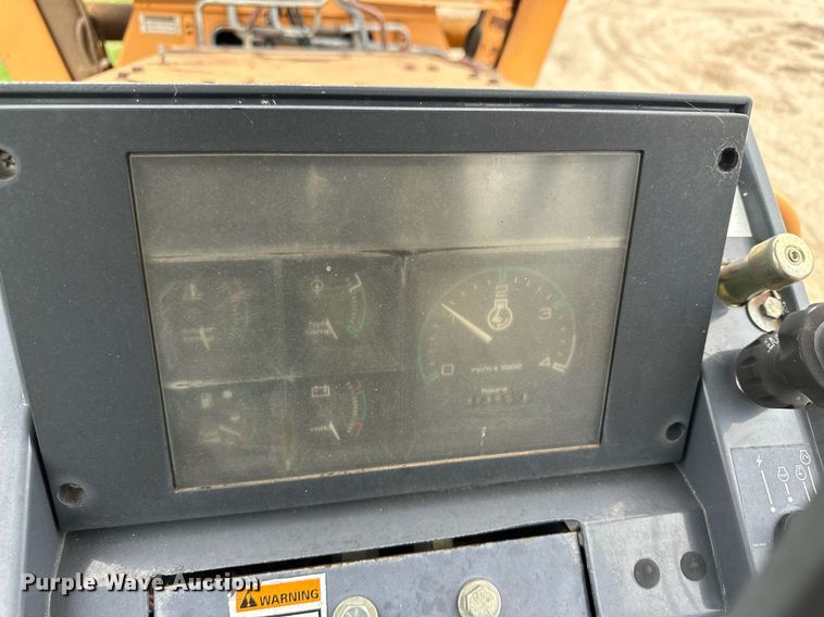 image for item NY9219 2000 Case 560  trencher with trailer